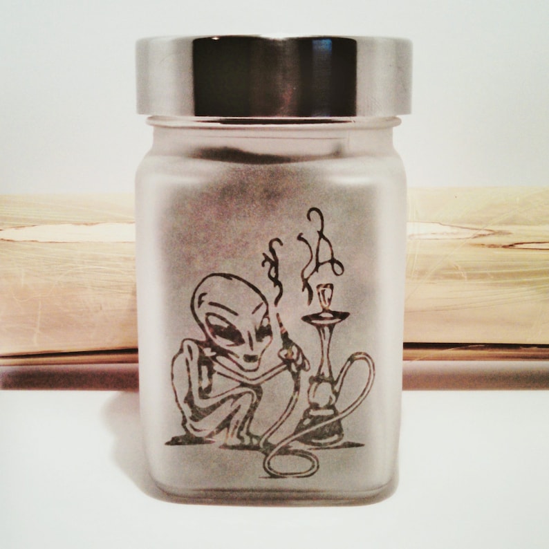 Out of this World Alien Stash Jar - Hookah Smoking Alien Etched Glass Herb Storage for Aliens and Stoner Gifts Must-Have Weed Accessories - Perfect for Storing Cannabis, Herbs, and More - A Great Gift for Any Stoner or Alien Lover in Your Life
