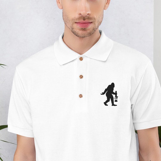 Disover Men's Soft Cotton Polo Shirt by Twisted420Glass - Embroidered Hidden BigFoot