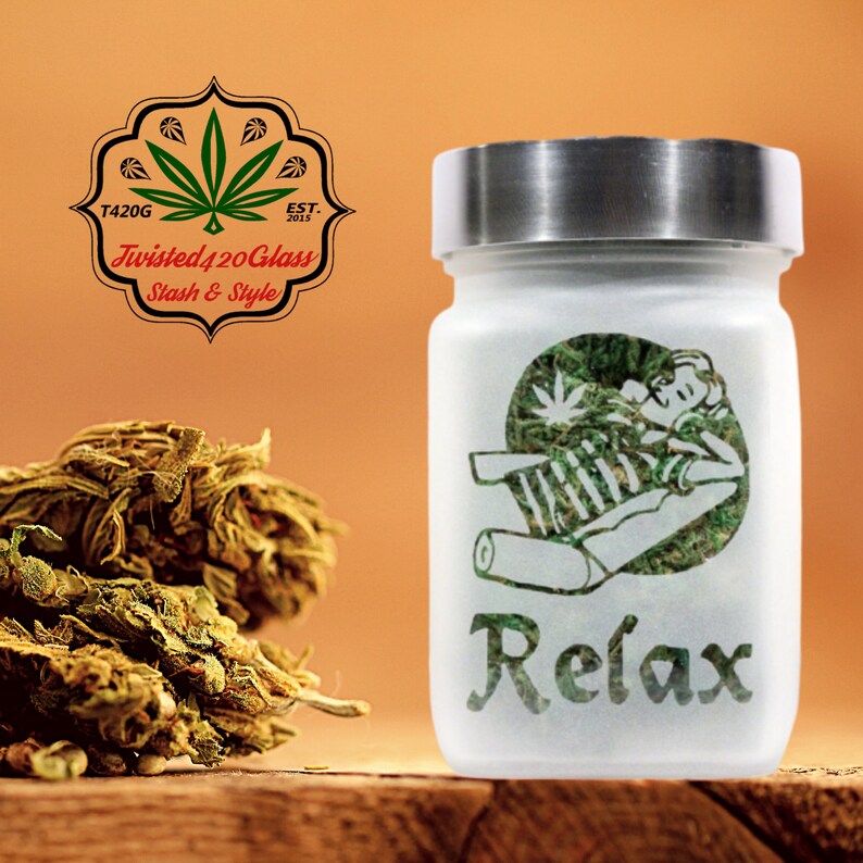 Unwind in style with the Time to Relax Deep Etched Glass Stash Jar by Twisted420Glass - the ultimate airtight and smell-proof container for storing your favorite herbs. Perfect for gifting and adding to your heady collection.