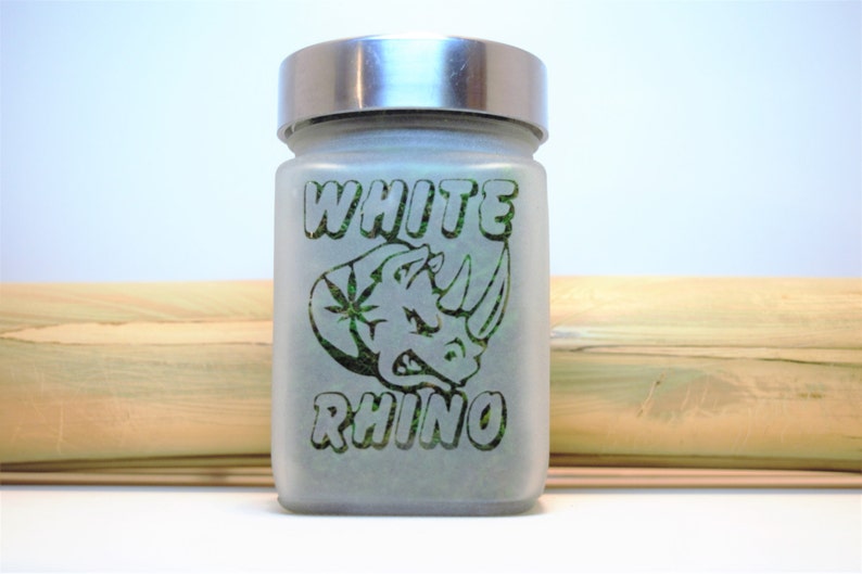 Discreet, airtight White Rhino etched glass stash jar perfect for keeping cannabis fresh and odorless. Makes a great gift for any cannabis enthusiast