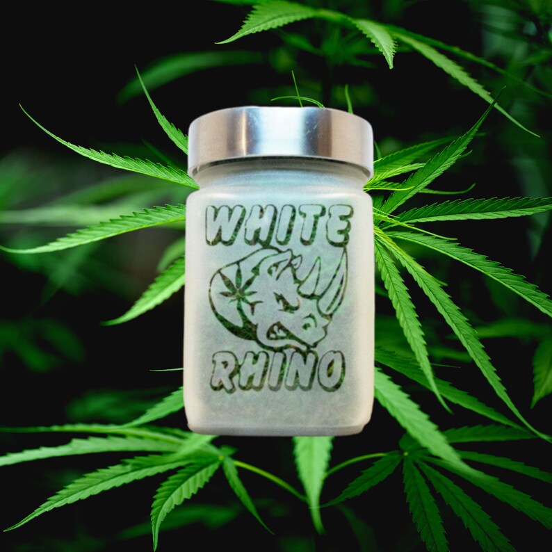 Discreet, airtight White Rhino etched glass stash jar perfect for keeping cannabis fresh and odorless. Makes a great gift for any cannabis enthusiast