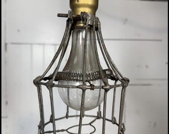 Vintage Industrial shop light with safety cage. 12' cord.