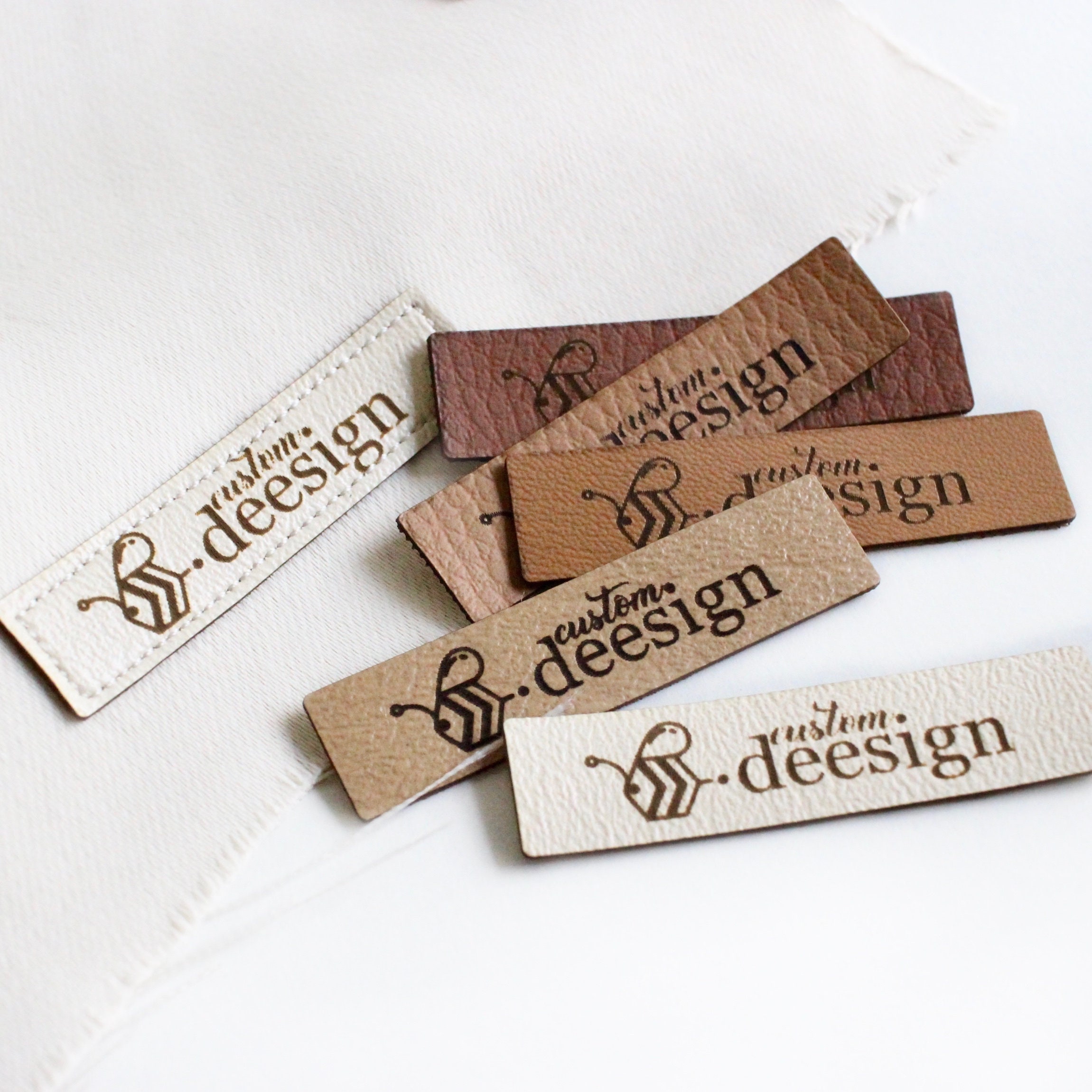 30pcs Sewing labels for clothes hats Personalized leather logo