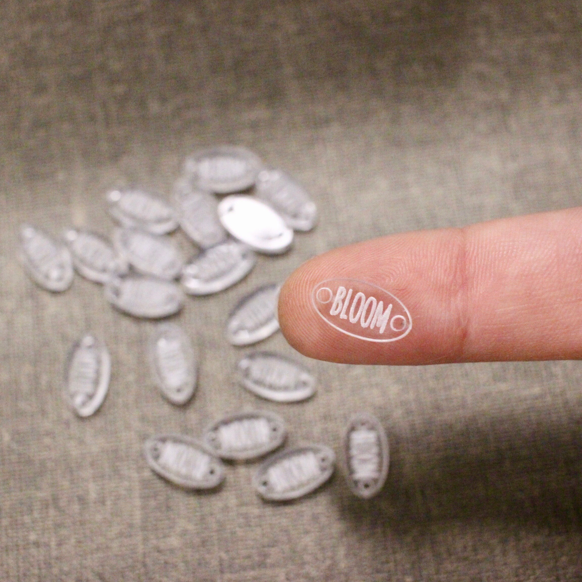 Tiny oval clear acrylic tag for jewelry making with custom logo or text