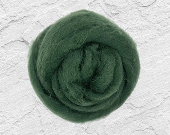 May include: A close-up of a ball of dark green wool roving. The wool is soft and fluffy, and it is perfect for felting or spinning.