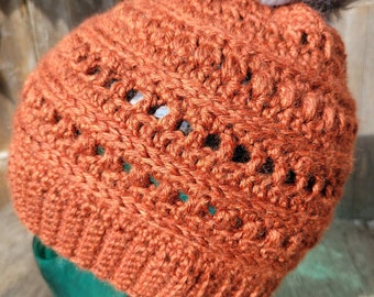 Crochet hat with pom