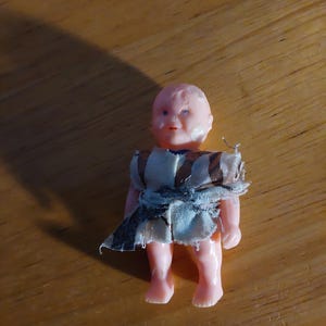 Tiny Vintage plastic doll
