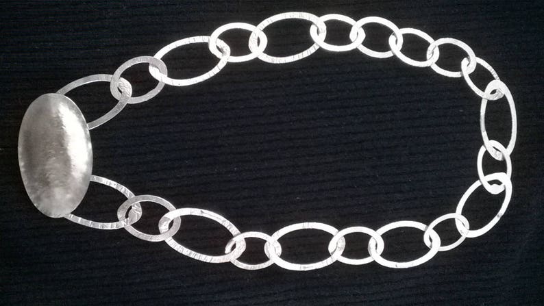 Handmade necklace with Central decorative element