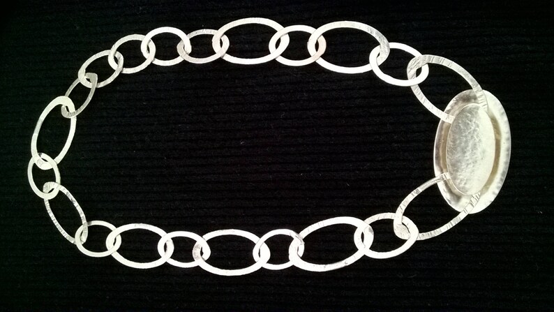 Handmade necklace with Central decorative element