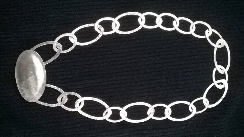 Handmade necklace with Central decorative element