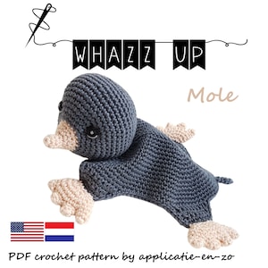 May include: A crochet pattern for a grey mole amigurumi toy. The pattern is available in English and Dutch. The pattern is called "Whazz Up Mole" and is by "applicatie-en-zo".