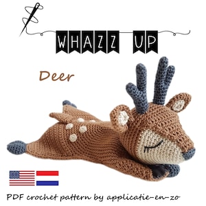 May include: A crochet pattern for a brown and white deer with blue antlers. The pattern is called "Whazz Up Deer" and is available as a PDF download.