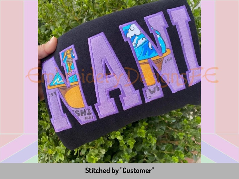 May include: Purple embroidered "NANI" lettering on a black sweatshirt. The letters are outlined in white and feature a cartoon image of a surfer girl on a surfboard.