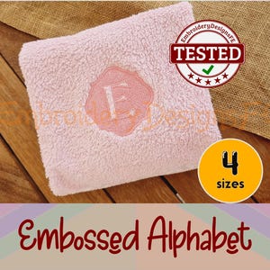 May include: A pink, fluffy towel with an embroidered letter "E" in a decorative frame. The towel is on a wooden surface with a burlap background. The text "TESTED" is in a red circle with a green checkmark. The text "4 sizes" is in a yellow circle.