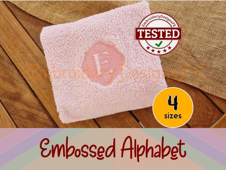 May include: A pink, fluffy towel with an embroidered letter "E" in a decorative frame. The towel is on a wooden surface with a burlap background. The text "TESTED" is in a red circle with a green checkmark. The text "4 sizes" is in a yellow circle.