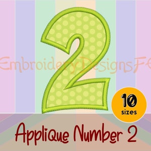 May include: Green applique number two with white polka dots. The number is outlined in green. The text "Applique Number 2" is below the number. The text "10 sizes" is in a yellow circle to the right of the number.