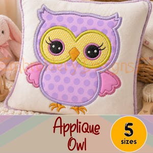 May include: A decorative pillow featuring an applique owl design. The owl has a purple body with polka dots, yellow eyes, and pink wings. The text "Applique Owl" and "5 sizes" are also visible.