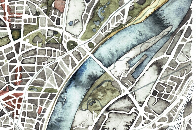 May include: A watercolor painting of a city map with a river running through it. The map is in shades of gray, brown, and green, with a blue river. The city streets are outlined in white.