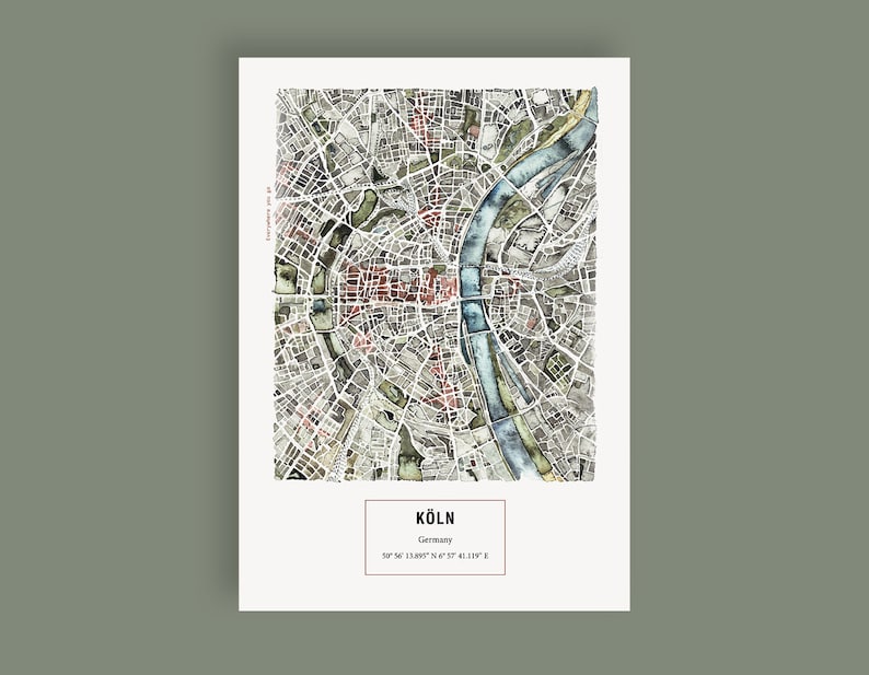 May include: A watercolor illustration of a map of Cologne, Germany. The map shows the city's streets, buildings, and the Rhine River. The text "K&Ouml;LN" is printed in black at the bottom of the map, along with the coordinates "50&deg; 56' 13.0897" N 6&deg; 57' 41.139" E."