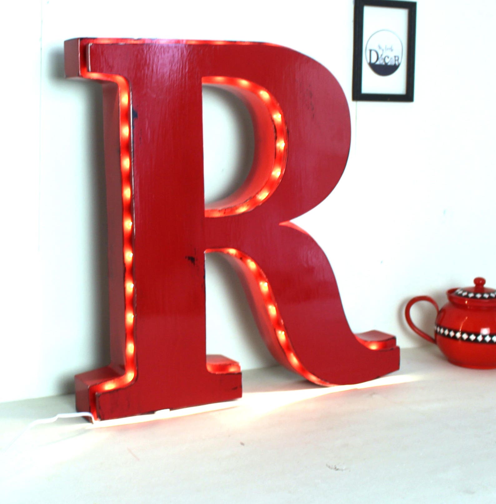grande lettre lumineuse