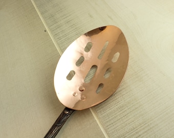 Copper slotted spoons