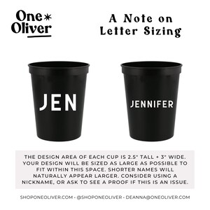 May include: Two black plastic cups with white lettering. The cup on the left says "JEN" and the cup on the right says "JENNIFER". The design area of each cup is 2.5 inches tall and 3 inches wide.