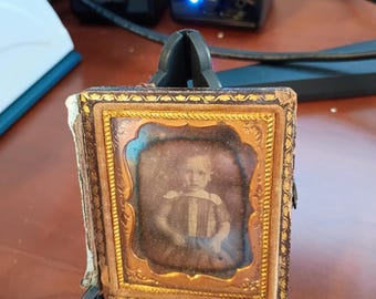 antique small daguerreotype photograph of small child