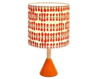 Mod orange table lamp, short and bright, orange print paper shade