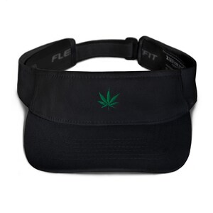 May include: Black visor with a green marijuana leaf embroidered on the front.