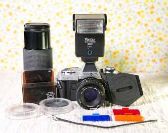 Minolta X-370 SLR with Two Lenses, Flash, Camera Bag and Extras. #SLR10