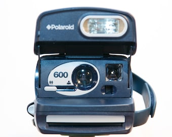 Polaroid blue and silver Instant 600 Camera with box