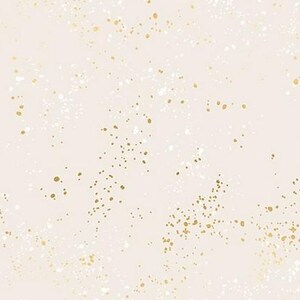 May include: A cream-colored background with a pattern of scattered gold and white speckles. The gold speckles vary in size and density, creating a textured, abstract design. The overall effect is a subtle, elegant pattern.