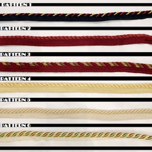 Puede incluir: Seis patrones diferentes de ribete, etiquetados como "Patrón 1" a "Patrón 6". El ribete es de varios colores y texturas, incluyendo negro, rojo, dorado, beige y verde.