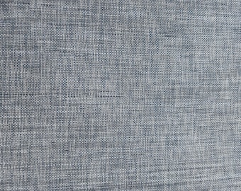 May include: Close-up of a grey woven fabric with a subtle texture. The fabric has a slightly rough feel and a slightly darker grey colour.