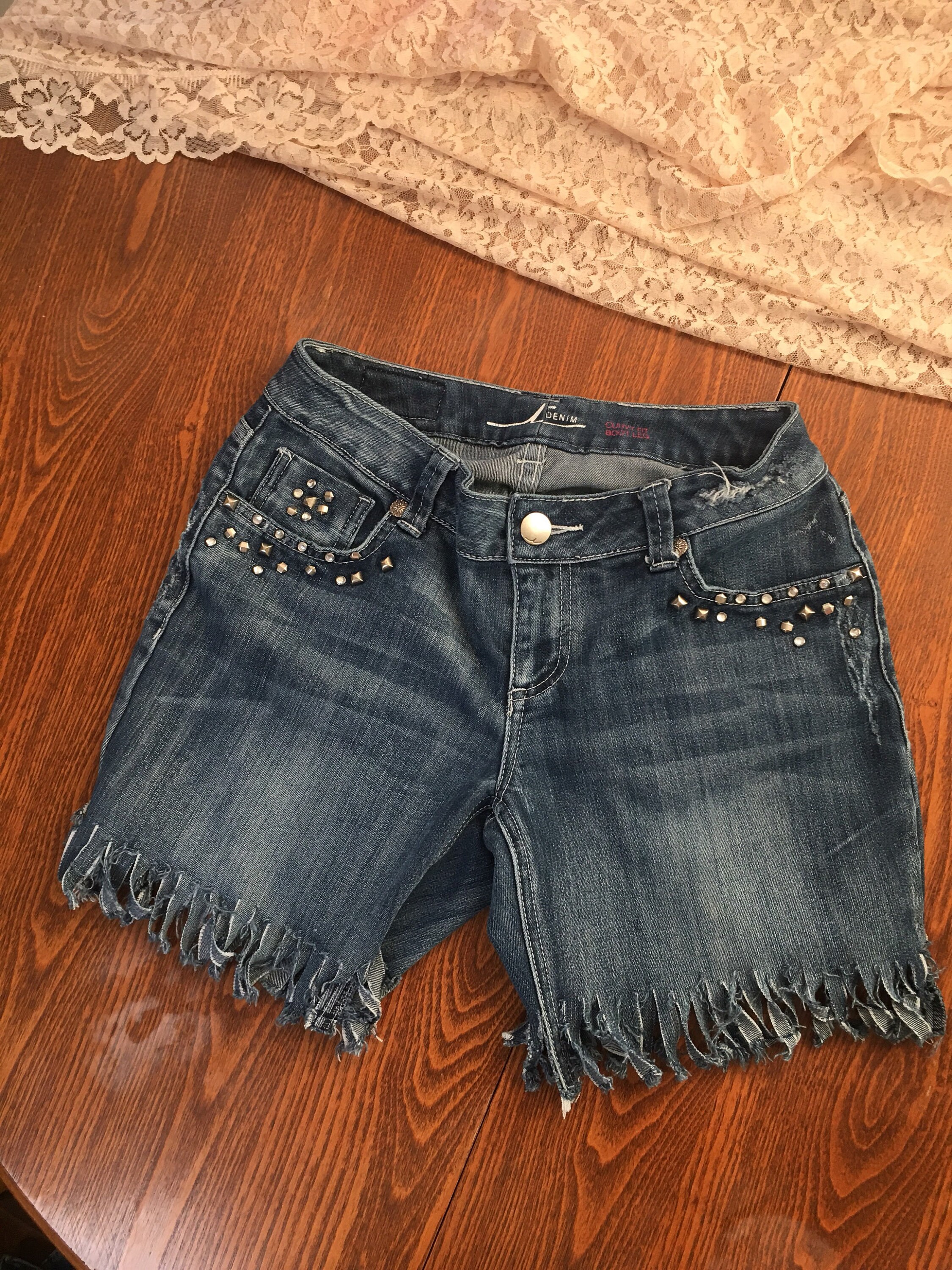 fringe cut off shorts