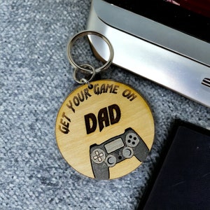 Get your game on Dad wooden keychain with game controller design