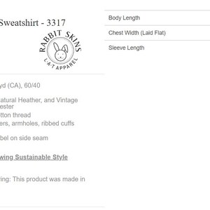 May include: A grey toddler fleece crewneck sweatshirt by Rabbit Skins, model 3317. The image includes a sizing chart with body length, chest width, and sleeve length measurements in inches for sizes 2T through 7, alongside product specifications.