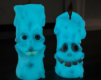 Silly cute with 2 teeth glowing in the dark aqua blue candle OOAK polymer clay sculpture with a glass flame handmade hand painted