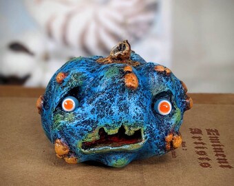 Creepy Blue Orange Pumpkin OOAK paper clay ornament with glass eyes handpainted with acrylics Halloween decorations