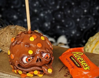 Cute Reese's caramel apple polymer clay figurine hand painted Halloween and Fall  inspired creepy food sculpture