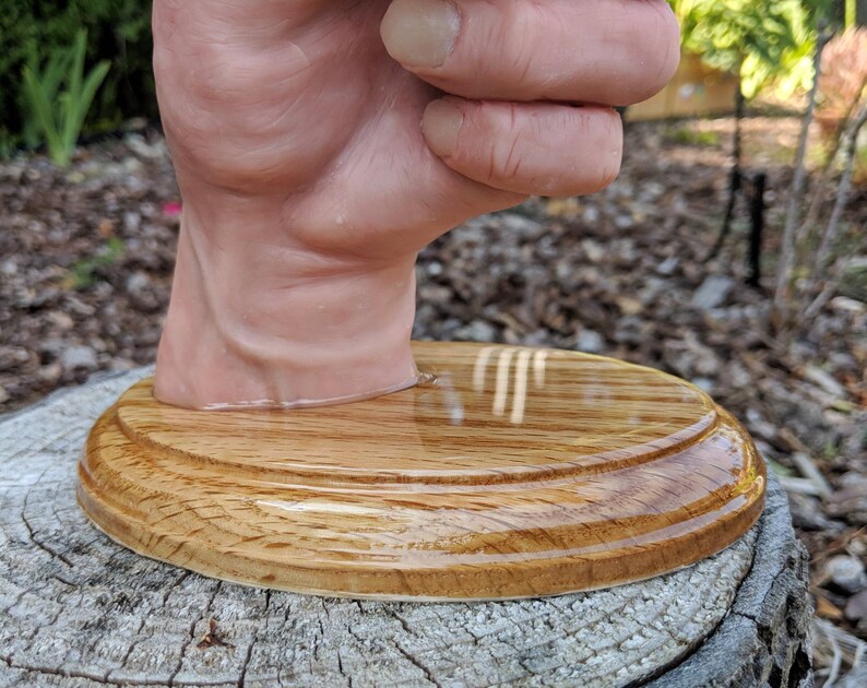 Realistic hand with a cartoonish aNGie Bird handmade sculpture OOAK on wooden oak base