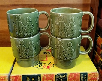 Vintage Japan Avocado Green Glazed Pottery Boy and Girl Kids Stacking Mugs Set of 4