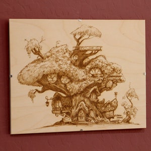 May include: A detailed woodburning illustration of a treehouse built into a large tree. The treehouse has multiple levels and windows, and there are smaller trees surrounding it.