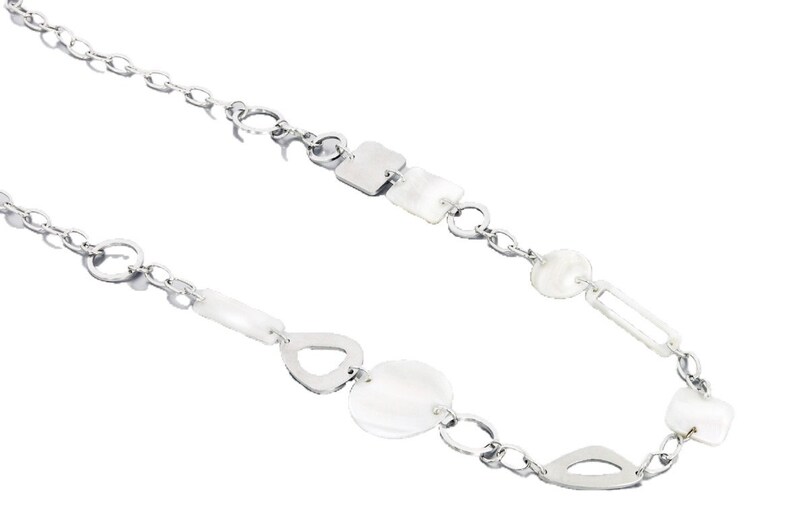 May include: A silver chain necklace with white shell and metal pendant charms.