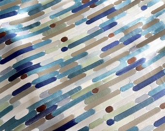 Sparkly green-blue jacquard fabric