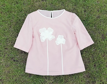 Pale pink cotton women's blouse with white 3D flowers application