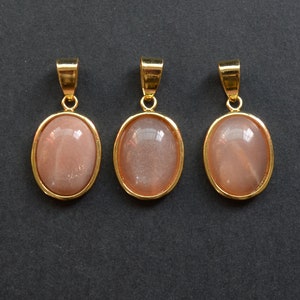 Nature 17 mm egg shape sunstone pendant with Gold Electroplated Edges