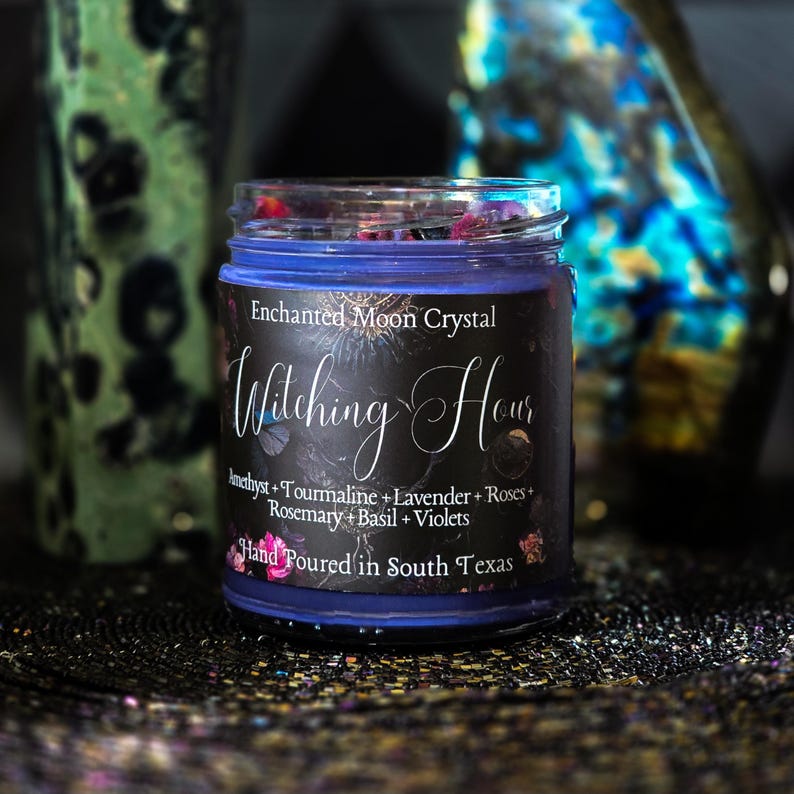 Witching Hour spiritual candle featuring black tourmaline, lavender, roses, rosemary, basil and violets in a deep purple handcrafted candle.