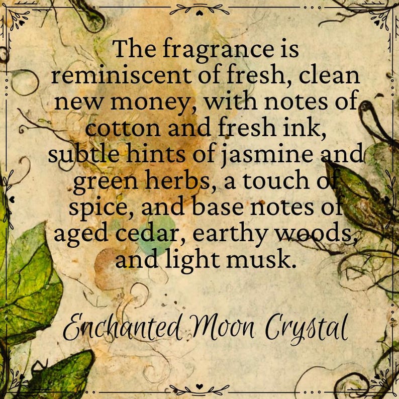 May include: A vintage-style image with a text description of a fragrance. The fragrance is described as having notes of fresh, clean money, cotton, fresh ink, jasmine, green herbs, spice, aged cedar, earthy woods, and light musk. The text also includes the words "Enchanted Moon Crystal".