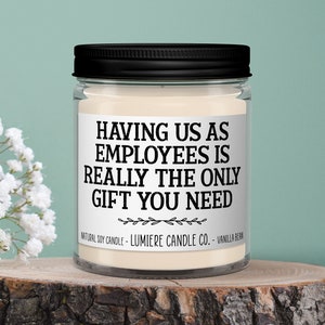 Your choice of a soy candle or wax melt. The label reads "Having Us As Employees Is Really The Only Gift You Need". Available in a variety of fragrances.